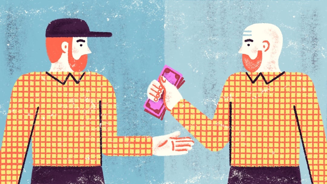 two people exchanging cash 