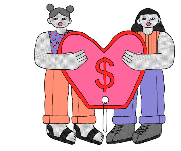 two people holding a large heart tag with a dollar sign